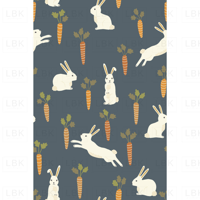 Easter Bunnies And Carrots On Dark Blue